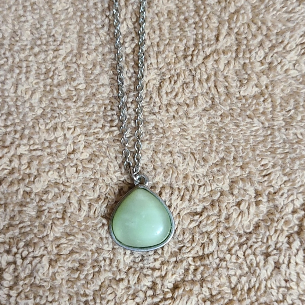 Green stone pendant with silver chain